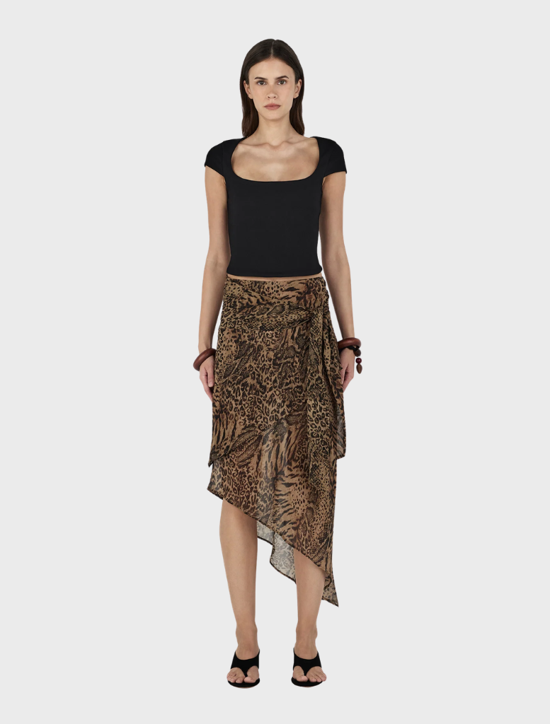 Sirocco's Phaedra Skirt is made of distinctive leopard print fabric, perfect for a fashionable look.