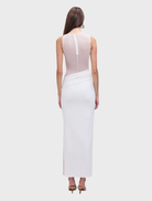 Chic white sleeveless maxi dress with a long, flowing cut, suitable for both casual and formal summer gatherings.