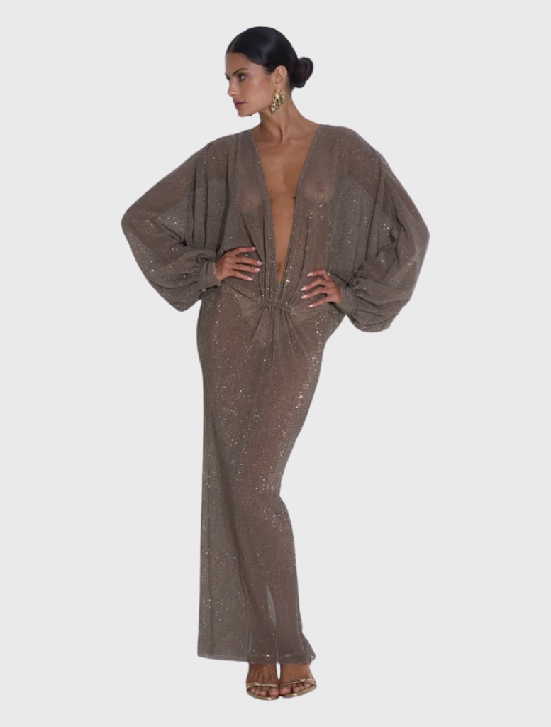 Smoke sequin gown with a plunging neckline and relaxed long sleeves, showcasing a fluid silhouette and luxurious texture.