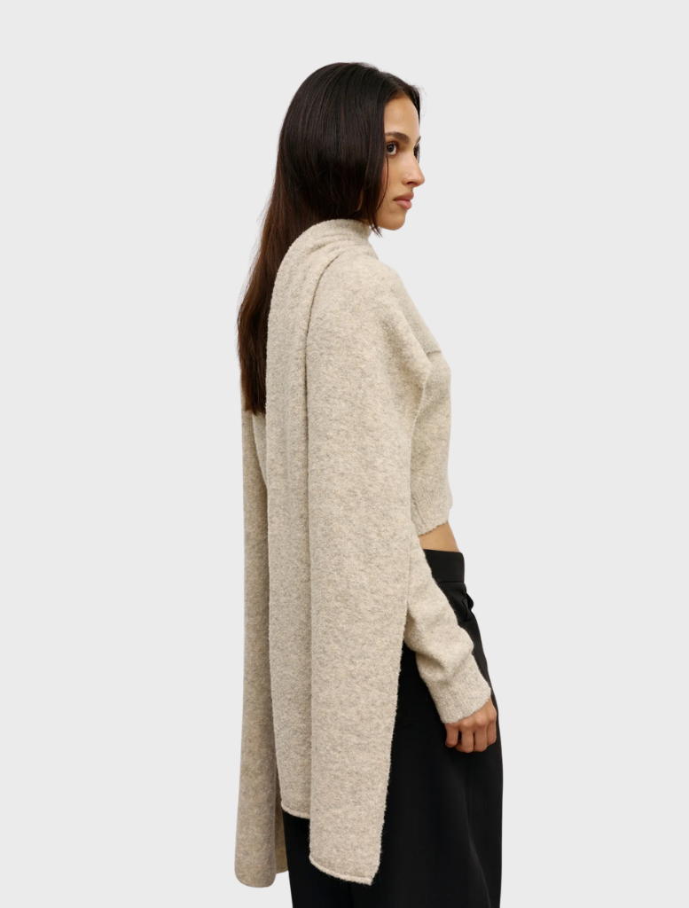 Soba Scarf in beige, named Urchin, offering a chic and cozy accessory for any wardrobe.