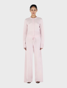 Lucielle Cashmere Cardigan in blush color, featuring a soft texture and elegant design suitable for various occasions.