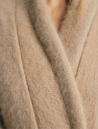 Elegant latte-hued Sophia Open Cashmere Cardigan, designed for comfort with an open front and soft cashmere fabric.