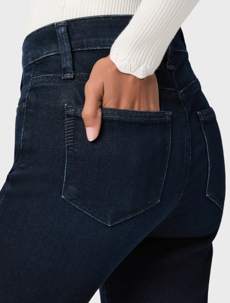 A model wearing Cindy Straight Jeans, demonstrating the fit and style of the straight leg design in a casual setting.