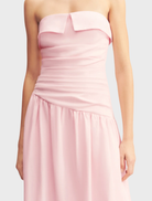 Gigi Strapless Maxi Dress, Sakura style, showcasing a long, elegant design with a colorful floral pattern.