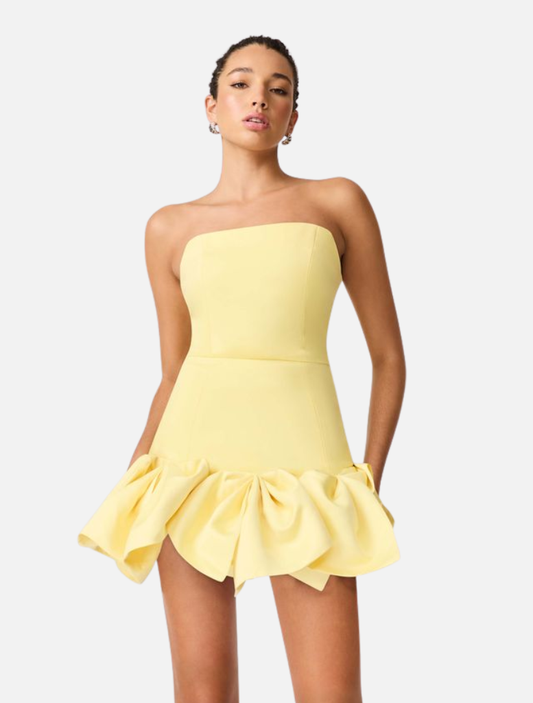 Evee Strapless Mini Dress in lemon yellow, featuring a ruffled skirt and a strapless design.