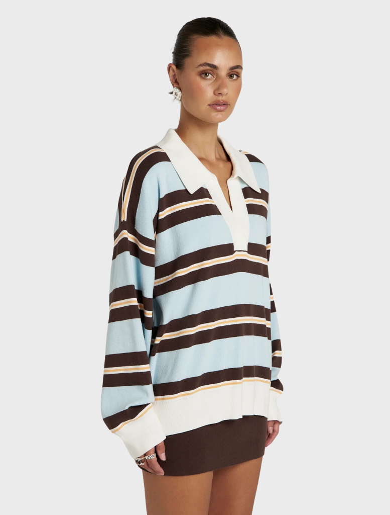 Long-sleeve polo shirt featuring a contemporary stripe design, ideal for casual wear and relaxed occasions.