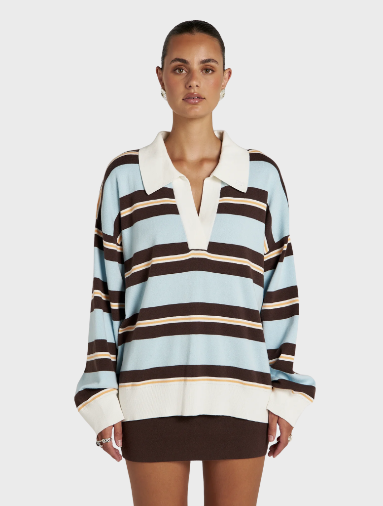 Long-sleeve polo shirt featuring contemporary stripes, designed for comfort and modern style in casual settings.