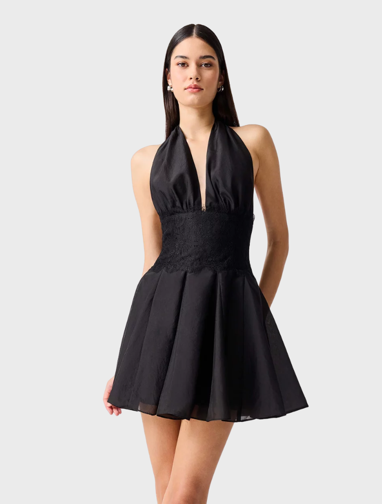 Elegant black mini dress with a halter neck design, showcasing a fitted style ideal for casual or formal occasions.