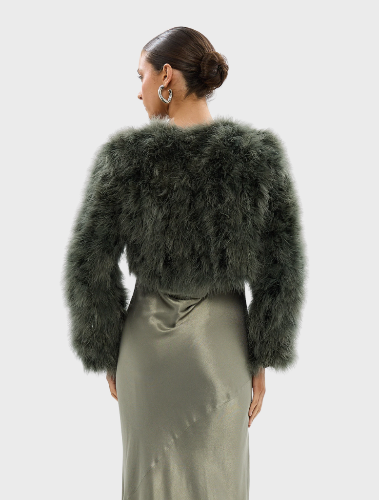 Elegant forest green crop jacket by Manhattan, designed for a chic and contemporary look.