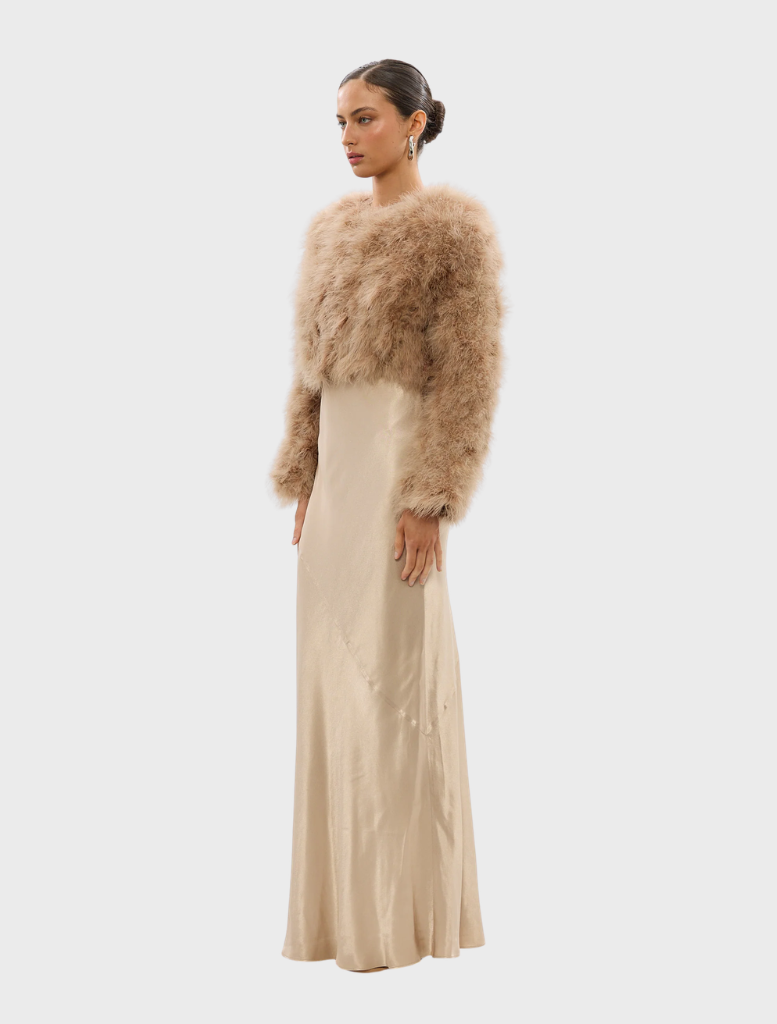 Elegant toffee Manhattan crop jacket, featuring a contemporary cropped silhouette for versatile styling.