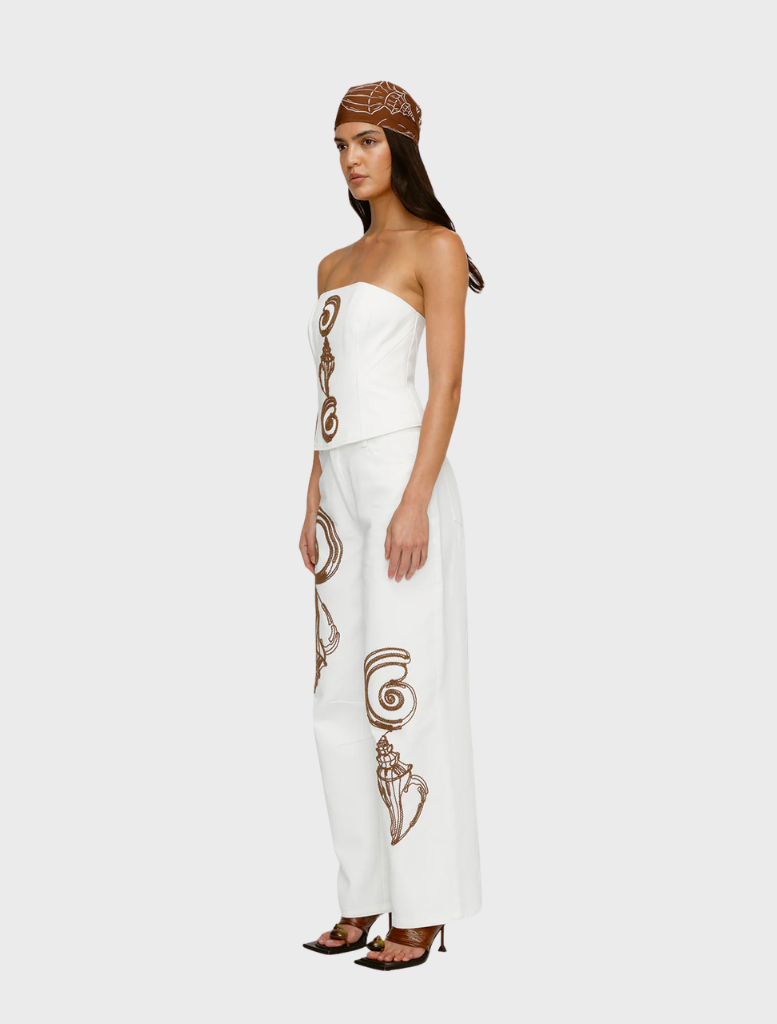 Chic ivory Maurie Jean dress, designed for elegance and versatility in formal settings.