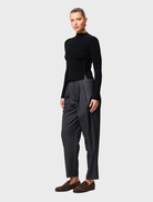 Black Windsor knit top showcasing a timeless silhouette, crafted for comfort and effortless style.