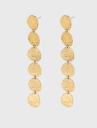 Elongated gold drop earrings with hand-hammered texture, lightweight design, and 9.2 cm drop length.