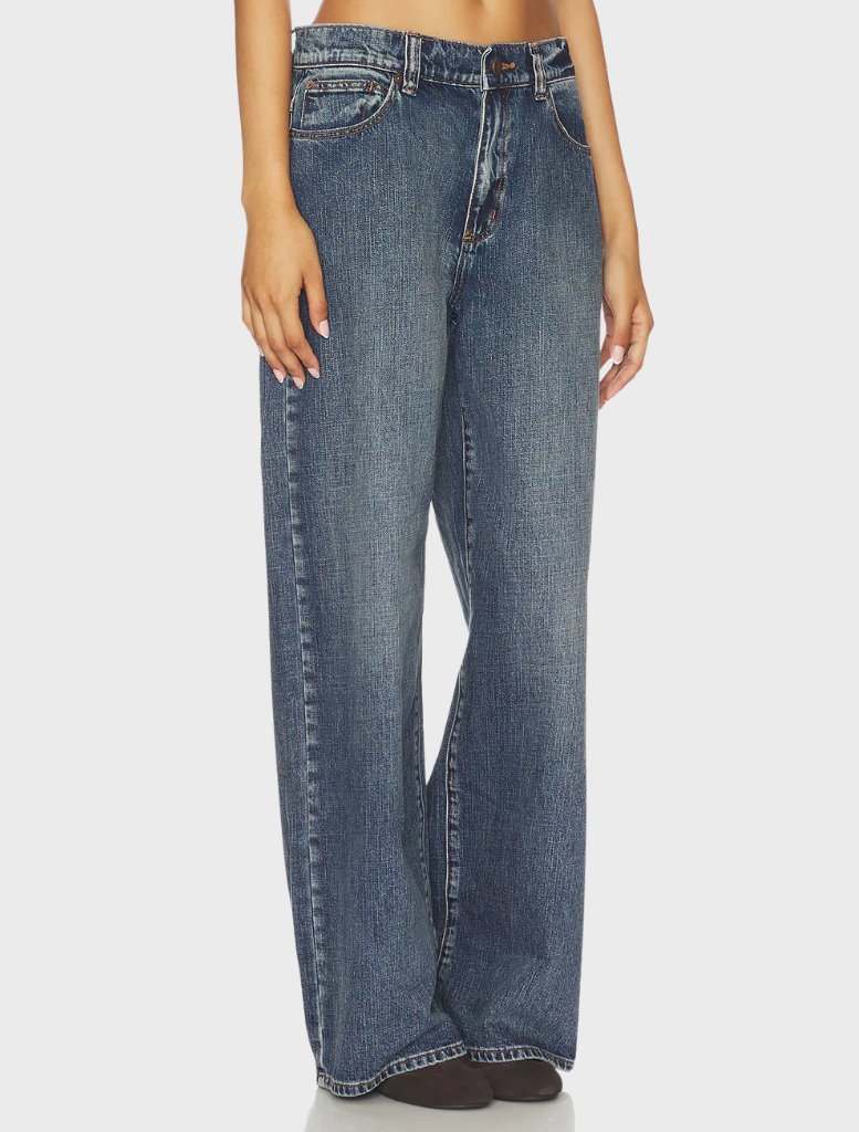 The 95 Super Baggy jeans displayed on a mannequin, highlighting their loose fit and trendy aesthetic in a fashion store.