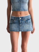 Fashionable super low mini skirt crafted from lace, highlighting a unique design and a contemporary, stylish appearance.