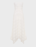 Milk-colored strapless dress with a tailored bodice and a flared skirt, ideal for special occasions or casual outings.