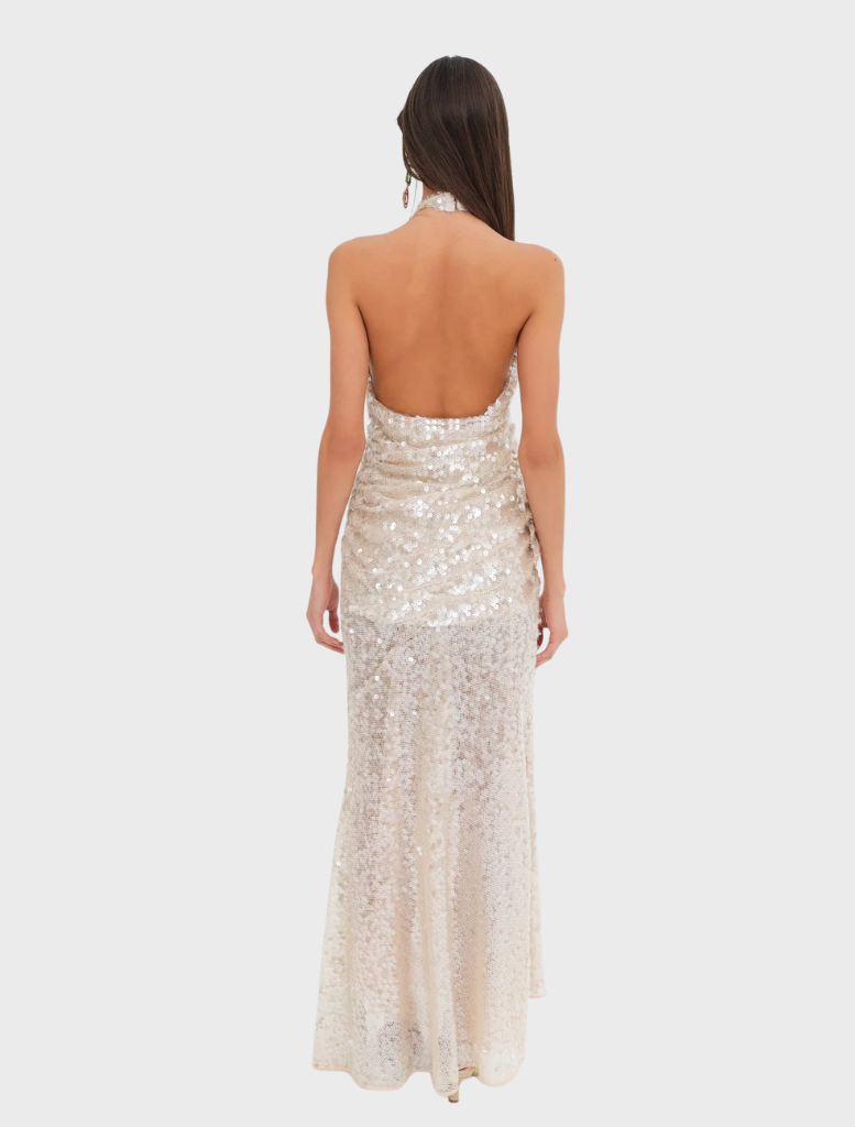  Chic nude maxi dress embellished with sequins, designed with a fitted bodice and a sweeping skirt for a glamorous look.