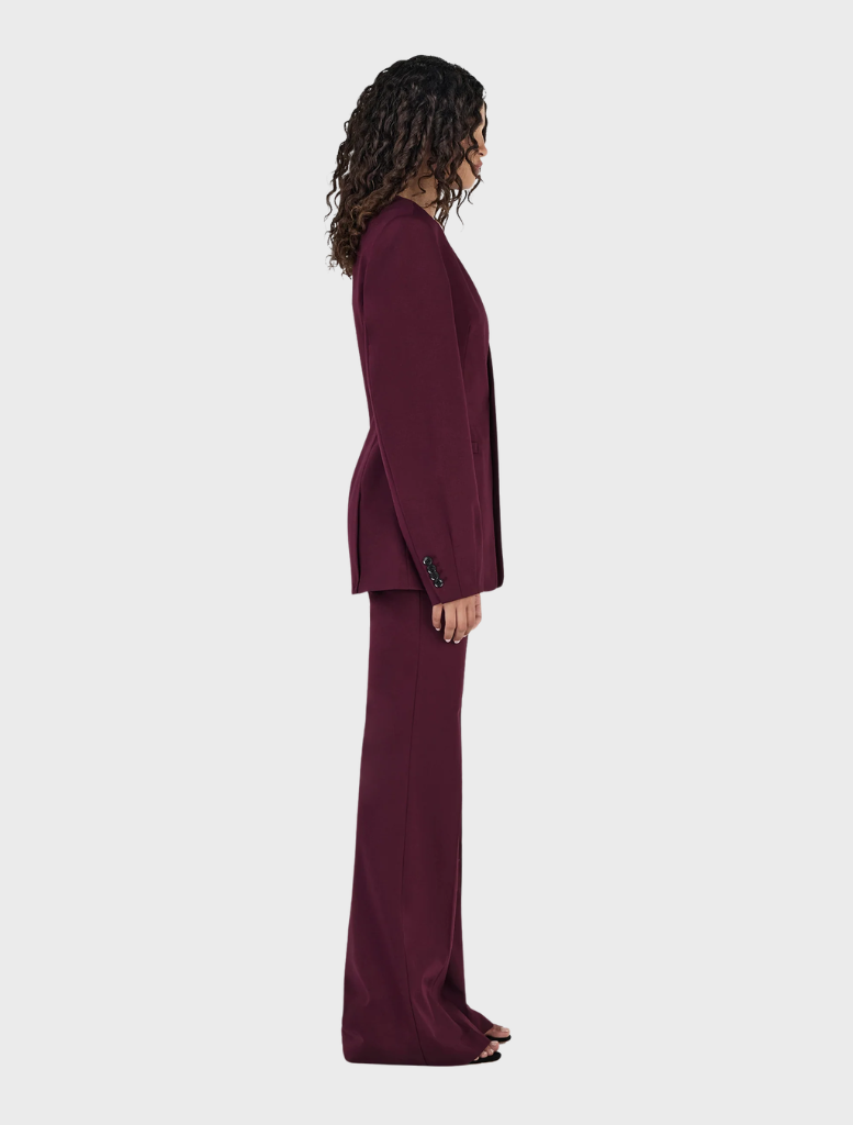 Maxine collarless blazer in maroon, offering a chic and contemporary look for various occasions and settings.