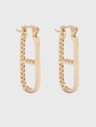 Gold OG Earrings, 14k gold-plated with clear crystals, inspired by the LOVE DRUG PILL necklace, supporting GIRLS Inc.