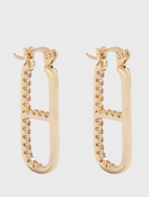 14k gold-plated OG Earrings embellished with crystals, inspired by the LOVE DRUG PILL necklace, aiding GIRLS Inc. initiatives.