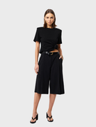 Chic black Tied & True Top designed for comfort and style, perfect for layering or standalone wear.