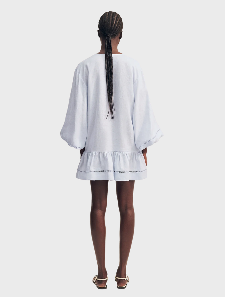 Elegant sky blue mini dress featuring balloon sleeves and a flared silhouette, ideal for summer outings or events.