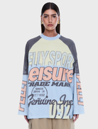 Soft cotton Trademark Long Sleeve Tee with a relaxed fit, featuring raglan sleeves and a bold graphic print for everyday wear.