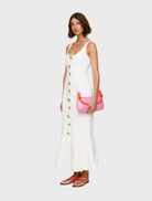 Elegant ivory cotton dress, the Sibel Denim Dress, designed with front buttons for a chic and timeless look.