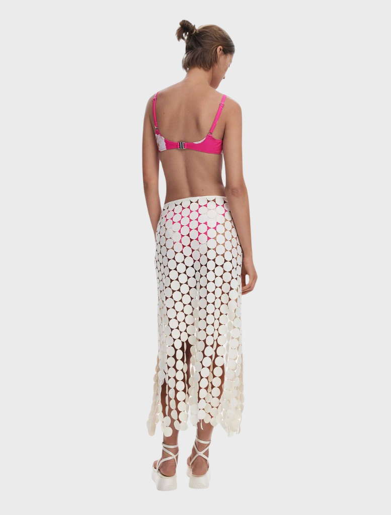 Elegant white pareo adorned with circular designs, perfect for beach or poolside attire.