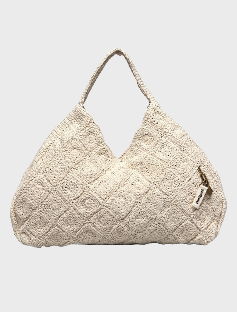 A contemporary white bag featuring a unique shape, ideal for fashion-forward individuals seeking practicality.