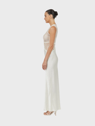 Graceful twilight dress, floor-length and in a soft dawn color, perfect for elegant evening wear or formal gatherings.