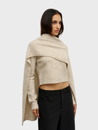 Elegant beige Soba Scarf called Urchin, designed with a unique texture for added warmth and style.