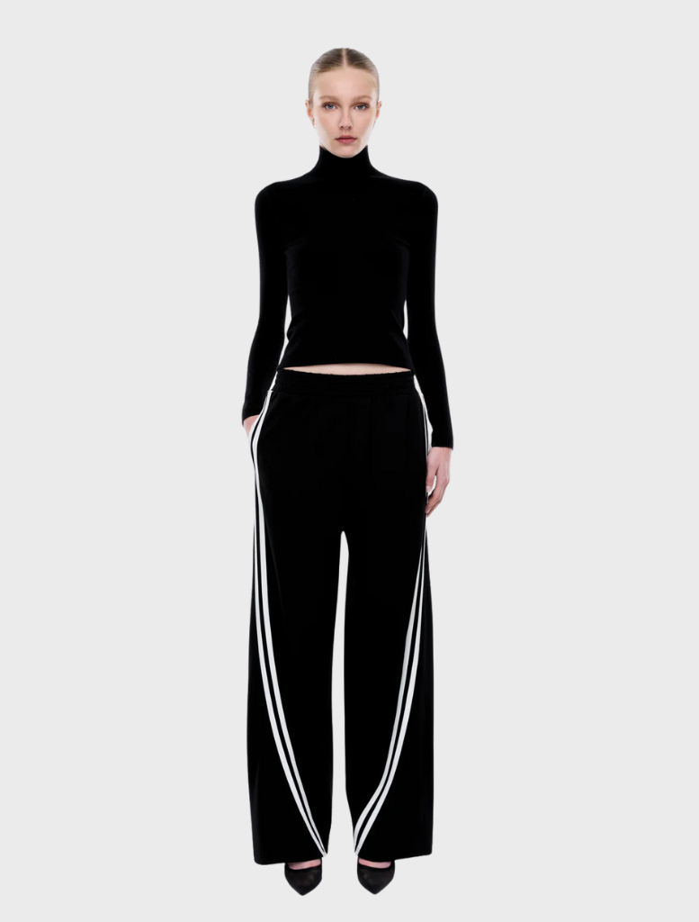 Black and off-white striped Valentina pants, featuring a stylish design suitable for casual or formal wear.