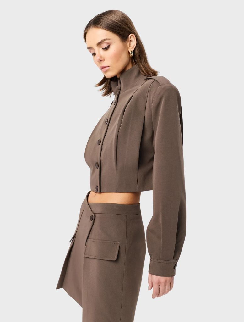 Mocha Vault Bomber jacket displayed, illustrating its fashionable design and warm color.