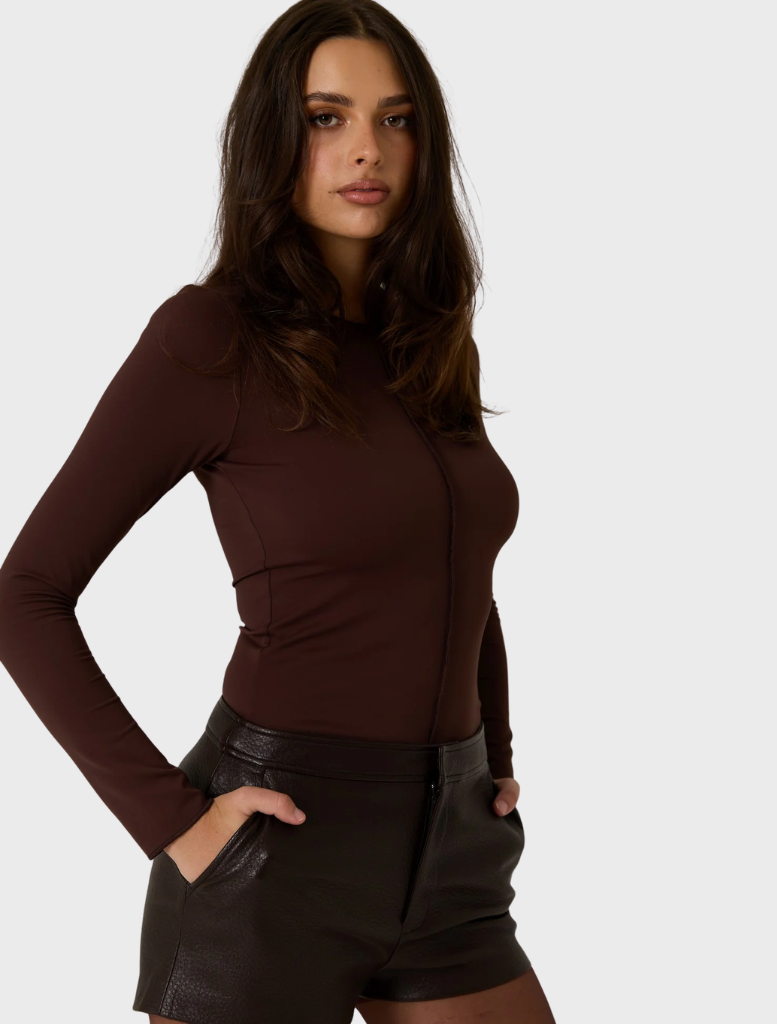 Chic dark truffle vegan leather shorts, combining elegance and sustainability for a fashionable wardrobe staple.