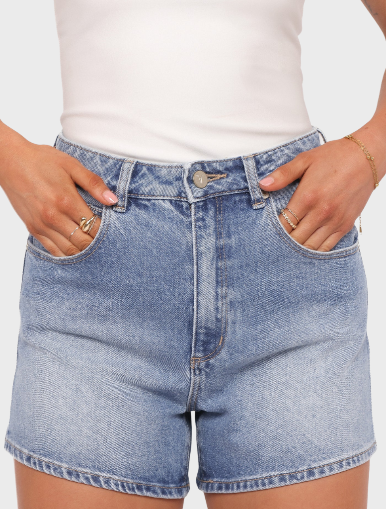 Lightweight Venice shorts in a soft Paloma hue, designed for comfort and style during casual summer activities.