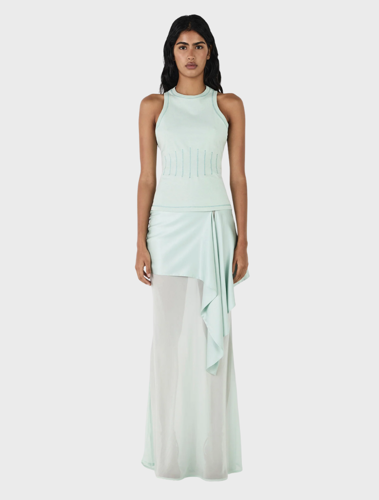 Vesper silk skirt in seafoam color, featuring a flowing design and elegant silhouette suitable for various occasions.
