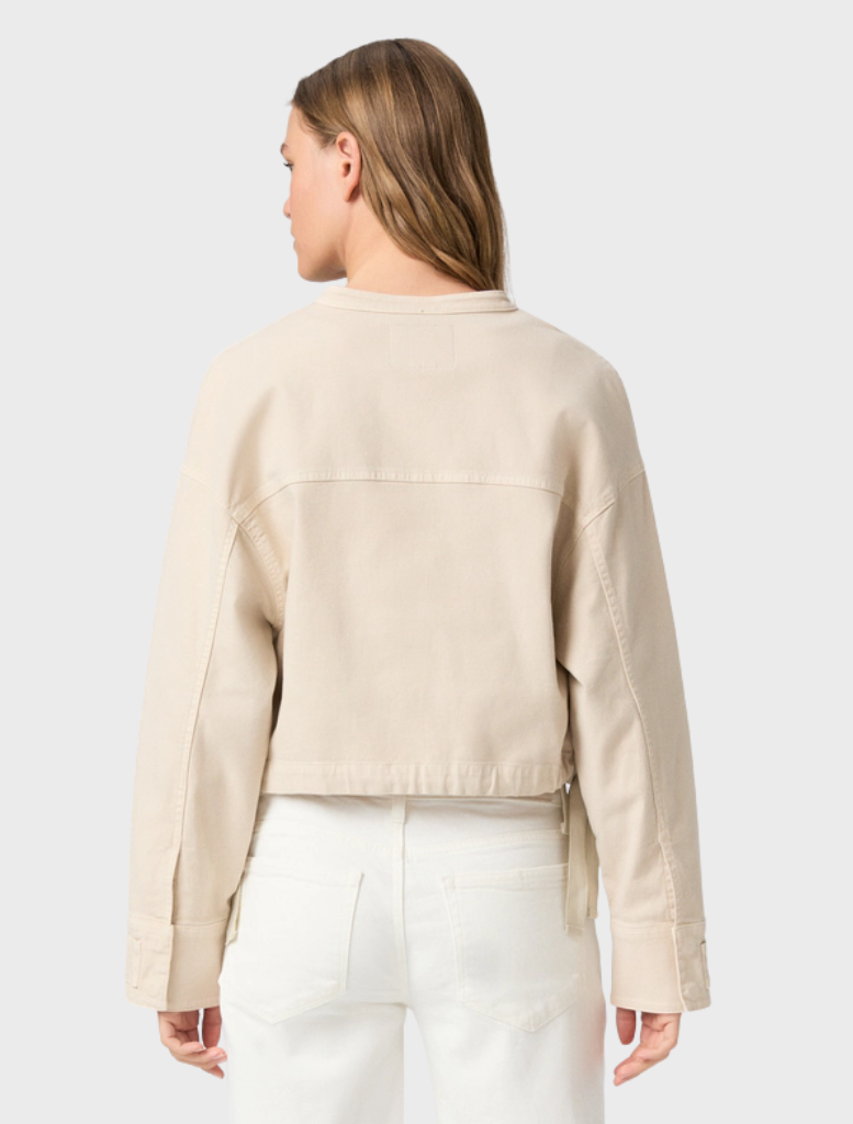 Vintage Biscotti Kiran Jacket, designed with a chic silhouette, offering versatility and elegance for any wardrobe.