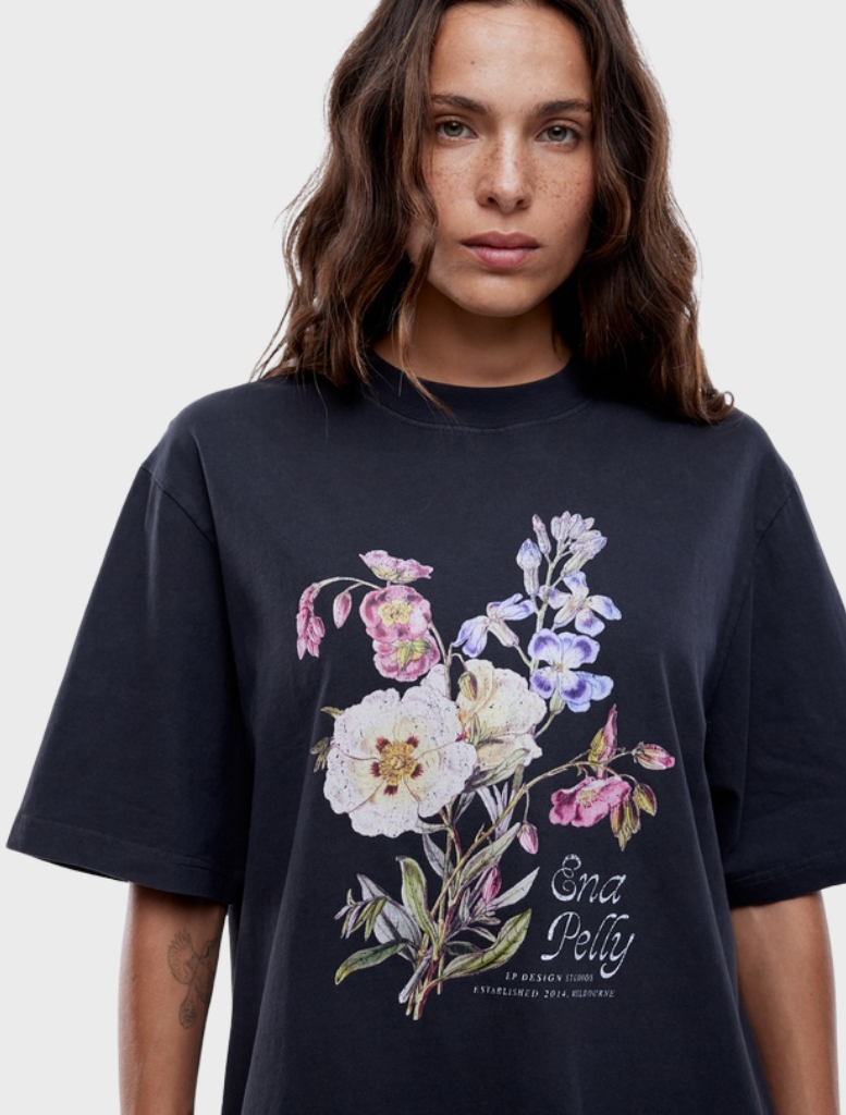 Vintage black Bouquet Tee adorned with a delicate floral design, combining comfort and style effortlessly.