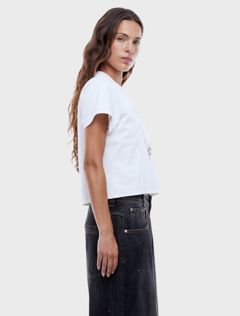 Relaxed-fit baby tee in vintage white with a charming rose heart graphic, ideal for casual wear.