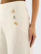 Waverly Pant in ecru color, featuring a sleek design suitable for casual or formal wear.