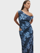 Elegant navy maxi dress with a rolling waves pattern, designed for a flowing and stylish look.
