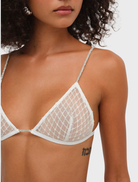 Shiny White bralette adorned with glitter, perfect for adding sparkle to any outfit.