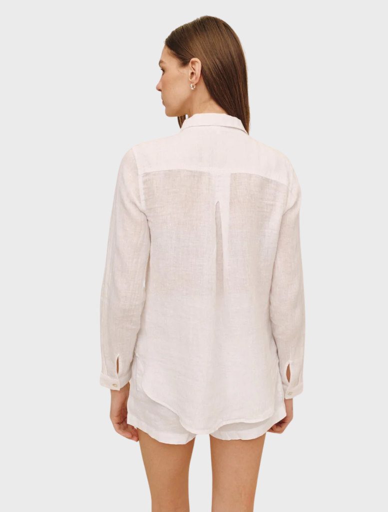 Elegant white linen button-down shirt featuring a pocket, perfect for casual or semi-formal occasions.