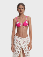 White pareo with a stylish circle pattern, suitable for summer fashion or beach cover-ups.