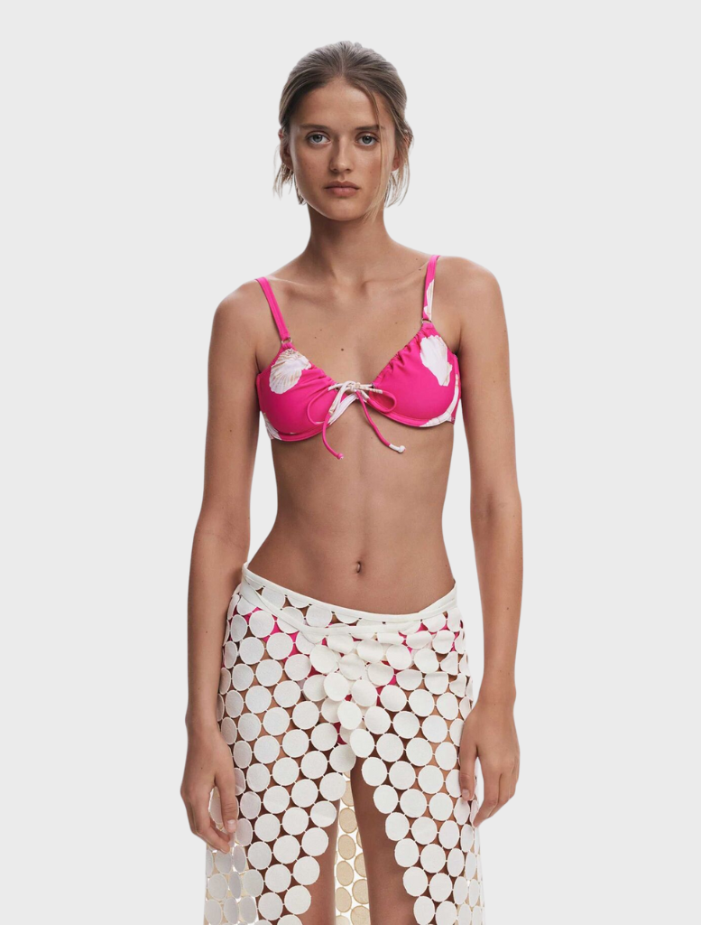 White pareo with a stylish circle pattern, suitable for summer fashion or beach cover-ups.