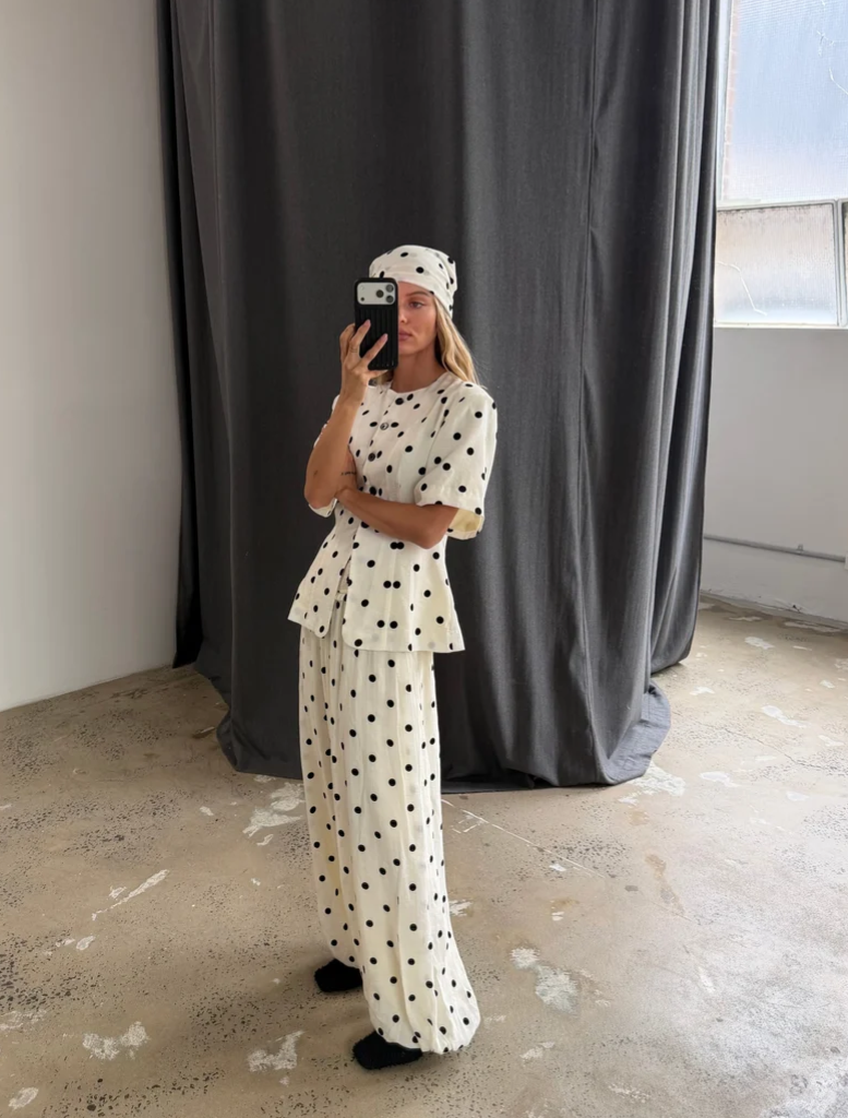The Heirloom Dot Willow Pant showcases a textured balloon silhouette, tapering gracefully at the ankle for a contemporary look.