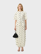 Willow Pant in Heirloom Dot features a voluminous balloon silhouette, tapering elegantly at the ankle for a modern, textured look.