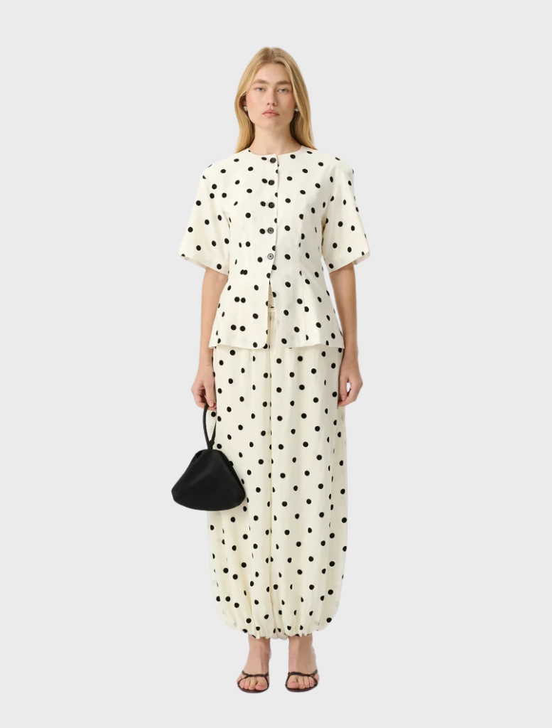 Willow Pant in Heirloom Dot features a voluminous balloon silhouette, tapering elegantly at the ankle for a modern, textured look.