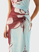 Featuring a bright floral Marisol Bloom design, the Avalon Dress combines elegance and comfort for any warm-weather event.